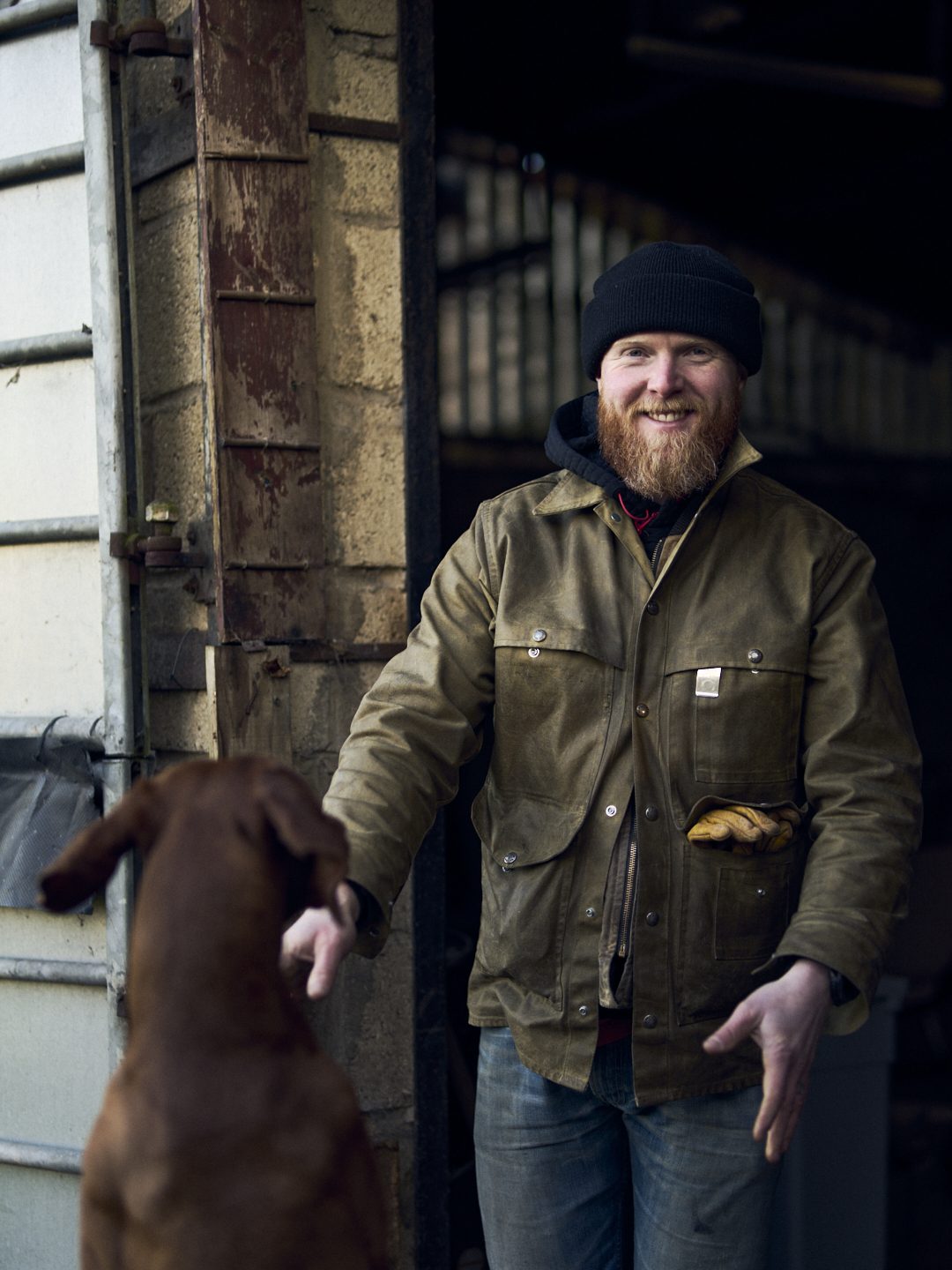 Ross at the barn with his dog